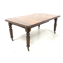 Victorian mahogany wind out extending dining table, rectangular moulded top raised on turned and reeded supports terminating in brass cup and ceramic castors, with one additional leaf