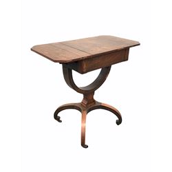 Regency rosewood work table, the hinged top lifting to reveal storage compartment with divisions, drop leaf with canted corners to each end, raised on a platform base with a hooped stretcher leading to four inverted splayed supports terminating in castors, with boxwood string inlay all over W47cm