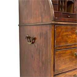 Mid-to-late 20th century camphor wood roll top campaign bureau, the cylinder roll opens to reveal document divisions, small drawers, cupboard and sliding writing surface, fitted with four graduating drawers, heavy brass carrying handles to each side, on bracket feet