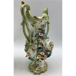 Victorian Coalbrookdale type floral encrusted twin handled vase, of baluster form, hand painted with floral sprigs with scroll peach ground handles and base, c1843, kite mark beneath, H28cm, together with a similar vase (2)