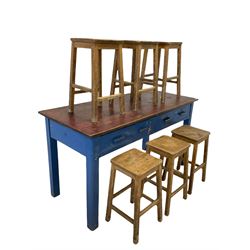 Early to mid 20th century hardwood school laboratory table, the flat projecting top over two long drawers, raised on block supports, together with set six oak laboratory stools with square supports