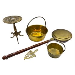 Large brass jam pot, smaller brass jam pot, bed pan, brass tripod trivet and another trivet (5)
