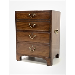 Late 18th century George III mahogany pedestal chest, fitted with two drawers above cupboard with two faux drawer front enclosing shelf, raised on shaped bracket supports, twin brass carry handles to each end