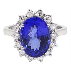 18ct white gold oval tanzanite and round brilliant cut diamond cluster ring, stamped 750, tanzanite approx 3.05 carat 