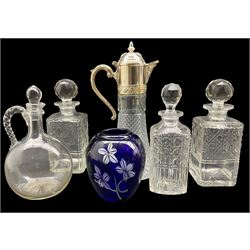 Blue sleeved glass vase, claret jug with plated cover, pair of square glass spirit decanters, another and a claret jug (6)