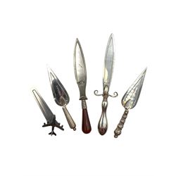Large silver sword shape bookmark by Crisford & Norris marked 'Silver', a trowel shape bookmark Birmingham 1899 by Adie & Lovekin, another Birmingham 1912 by Miller Bros. a pewter bookmark and one other (5)