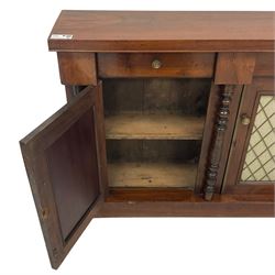 19th century walnut chiffonier or side cabinet, rectangular top over two drawers and two cupboards, enclosed by brass grille doors with fabric linings, ring turned upright columns, on plinth base 