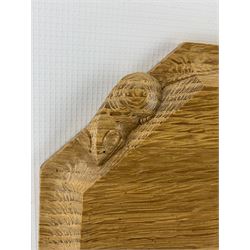 Mouseman - oak breadboard, canted rectangular form, the moulded edge carved with mouse signature, by the workshop of Robert Thompson, Kilburn