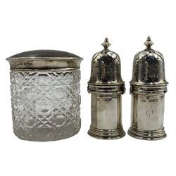 Pair of Victorian silver vase shape salt and pepper pots with engraved domed covers London 1891 Maker Asher Solovitch and a glass dressing table jar with silver and tortoiseshell lid Birmingham 1922 (3) 