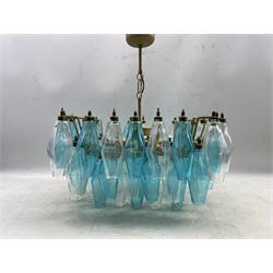 Murano Poliedri chandelier designed by Carlo Scarpa for Venini, the tiered gilt metal frame supporting Murano clear and blue handblown glass drops, W51cm x H50cm 