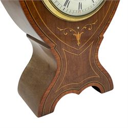 French - Edwardian Art-Nouveau 8-day bedside table clock with satinwood and ebony inlay, enamel dial with Roman numerals, minute track and steel spade hands within a convex glass and brass bezel, single train movement with a cylinder platform escapement, wound and set from the rear. With key.