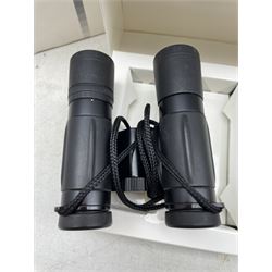 Pair of Leica Trinovid 10x25 BCA binoculars, in original box 