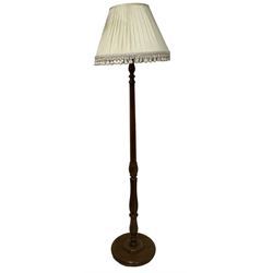 Turned walnut standard lamp with shade