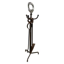 Collection of fireside accessories - fireside tools on stand (H92cm); fire dogs or andirons with rose cast terminals and globular brass mounts; pierced fire curb; wrought metal spark screen; two fireside tools (7)