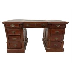 20th century mahogany partners desk, the inset top over three frieze drawers each side, over six drawers and two cupboards, raised on a plinth base W150cm, H79cm, D80cm 