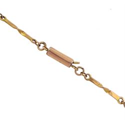 Art Nouveau gold garnet pendant, on a rose gold fancy twist chain necklace, both 9ct