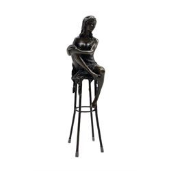 Art Deco style bronze figure of a lady with knee in her hands, seated on a stool, with foundry mark, H27cm