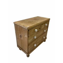 Victorian pine chest, fitted with two short and two long graduated drawers, raised on turned supports W90cm, H82cm, D43cm