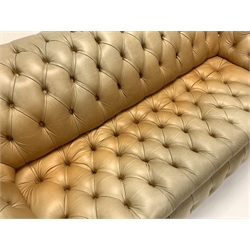 Late 20th century three seat Chesterfield sofa, upholstered in deep buttoned tan leather, raised on turned walnut supports, W221cm, H78cm, D105cm