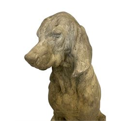 Two composite stone life-size hound garden figures