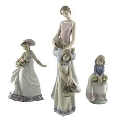 Large Lladro figure 'Someone to look up to' No.6771 and three smaller Lladro figures 'Carefree' No.5790, 'May Flowers' No.5467 and 'Floral Treasures' No.5605 (4)