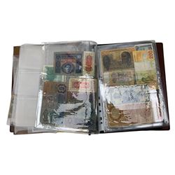 Great British and World banknotes, including Bank of England Page one pound 'ES41', various The Japanese Government banknotes, Queen Elizabeth II East Caribbean Currency Authority one dollar 'B69 706721', various Chinese banknotes etc, housed in a folder