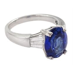 18ct white gold single stone oval cut sapphire ring, with tapered baguette diamond shoulders, sapphire approx 4.15 carat