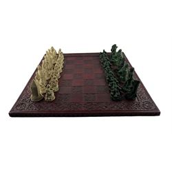 Composition chess set on a wooden board 60cm square
