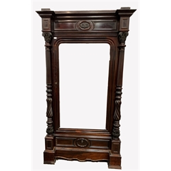 French stained walnut armoire wardrobe, frieze with leaf carved applied roundel, over bevelled mirrored door revealing birds eye maple lined panelled interior, fitted for hanging, flanked by leaf capped and fluted columns, single drawer to base, raised on moulded block supports, W121cm, H215cm, D61cm,