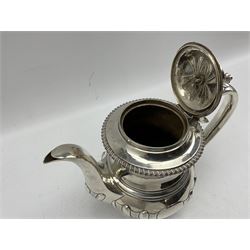 George IV silver coffee pot of baluster design with leaf capped handle, vacant heart shape cartouches, compressed circular lift and gadrooned border on a short pedestal foot H21cm London 1821 Maker Crespin Fuller 26.5oz