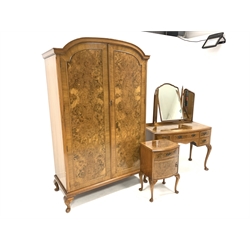 20th century burr walnut 'Dillon' bedroom suite, comprising double wardrobe with interior fitted for hanging, with shoe rail and one shelf, (W120cm, H203cm, D58cm) dressing table with mirror back over five drawers, (W107cm) and a bedside cupboard, (W46cm) 