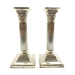 Pair of late Victorian silver Corinthian column table candlesticks with square bases H20cm Birmingham 1898 Maker J Sherwood & Sons