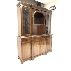 Reproduction mahogany breakfront illuminated cocktail display cabinet, with dentil cornice over glazed doors enclosing adjustable shelves, four drawers and four cupboards under, raised on bracket supports, W160cm, H194cm, D50cm