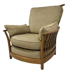 Ercol - pair of mid-20th century elm and beech 'Renaissance' armchairs, with beige upholstered loose cushions