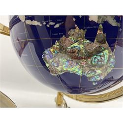 Table top terrestrial globe inset with semi precious stones on a blue ground in metal frame with compass H50cm