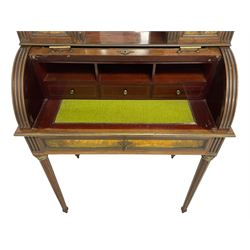 20th century French Empire design mahogany cylinder roll bureau, raised canopy top over bevelled mirror back supported by fluted columns, mounted by gilt metal gallery decorated with linen swags, two raised sections fitted with small drawers, the Vernis Martin painted barrel roll depicting a man with a guitar and a woman reading within a garden landscape with architectural follies and trees, frieze drawer below, mounted by gilt metal mouldings and foliate cast escutcheons, raised on tapering fluted supports with brass capitals and feet 