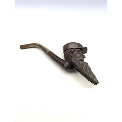 Early 20th century Briar pipe in the form of a bearded gentleman wearing a cap, inset glass eyes and curved horn stem and mouthpiece, L23cm 