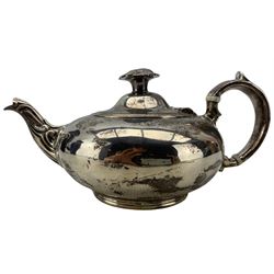 Victorian silver teapot of compressed circular form, floral lift and loop handle London 1862 Maker William Hunter
