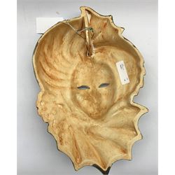 Painted pottery face mask modelled as a lady wearing an elaborate headdress, H36cm