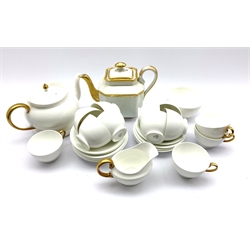 Aynsley part tea set in white with gilt handles comprising twelve cups and saucers, tea pot and stand, milk jug and sugar bowl together with a similar coffee pot (29)