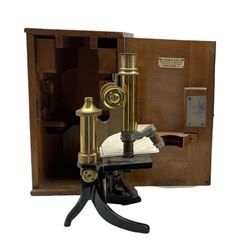 Black and brass compound microscope by E Leitz Wetzlar No.76336, the mahogany case marked Stanley & Co.