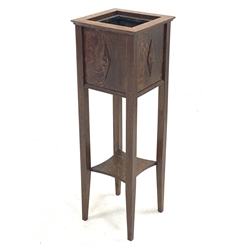 Early 20th century oak square plant stand with metal liner, the sides decorated with stepped lozenge, supports joined by undertier, 30cm x 30cm, H93cm