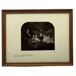 Limited Editon photographic print of 'Lewis Carroll and the Macdonald Family', taken after the original by Lewis Carroll c1865, no. 9/85, mounted and framed, 16.6cm x 19cm