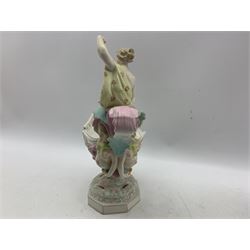 19th century Milan San Cristoforo navette shape centrepiece in the form of a cherub on a dragon accompanied by a female figure, painted with masks, dragons etc and on a pedestal foot H30cm x L29cm and another of very similar design