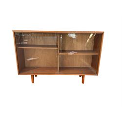 Teak bookcase with two sliding glass doors enclosing shelves 