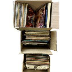 Quantity of LP records in three boxes 