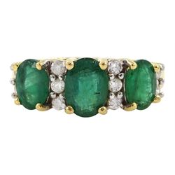 18ct gold three stone oval cut emerald and round brilliant cut diamond ring, hallmarked