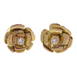 Pair of 14ct gold round brilliant cut diamond stud earrings, in floral settings, total diamond weight approx 0.20 carat 