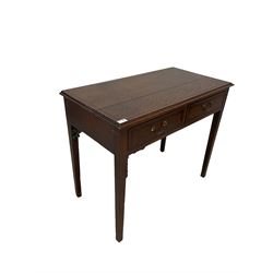 Georgian oak side table, the rectangular top with moulded edge over two cross band inlayed drawers, raised on square tapering supports 