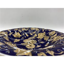 Meissen cobalt blue ground shaped bowl, decorated in relief with gilt heightened foliage, crossed swords mark in underglaze blue beneath and impressed 188, D29cm